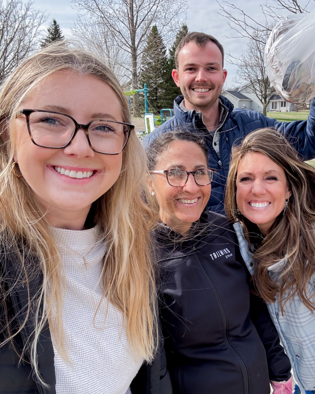 Tailwind Group employees doing volunteer work in the community