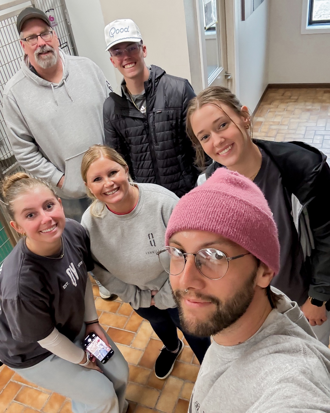 Tailwind Group employees doing volunteer work in the community for a local animal shelter
